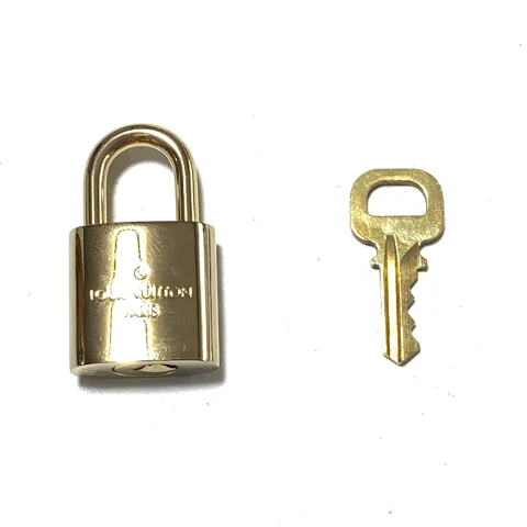 Gold Metal Louis Vuitton Key Holder